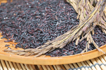 Thai Riceberry Rice on  wooden background