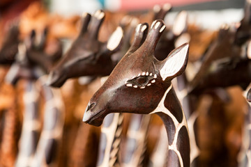 Closeup of generic African carving of a giraffe. This is generic artwork and widely available throughout South Africa.