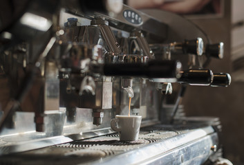Making coffee on professional coffee machine