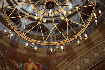 Vintage golden lamp inside the church