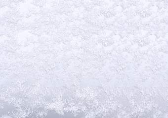 Beautiful Christmas silver background snow texture with snow flakes.