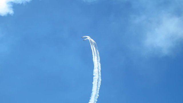 Acrobatic airplane exhibition. Flying airshow
