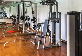 health exercise equipment in modern fitness center gym room