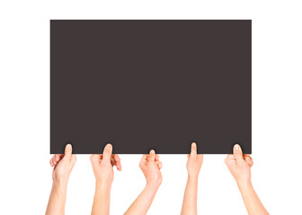 lot of hands holding a dark banner