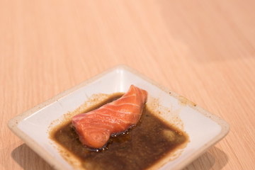 Salmon sahimi in wasabi sauce