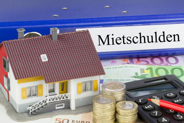 Mietschulden Ordner mit Haus und Geld