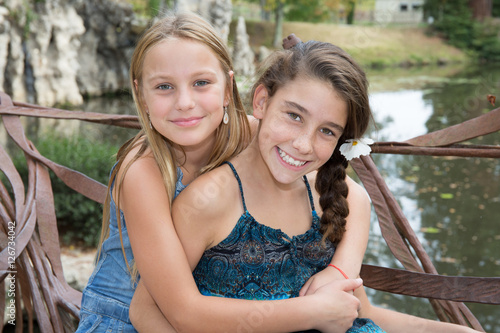 Preteen Girls Are The Best Of Friends Outdoor Stock Photo A