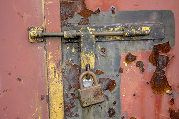 Old metal rusty gate and padlock Texture Background