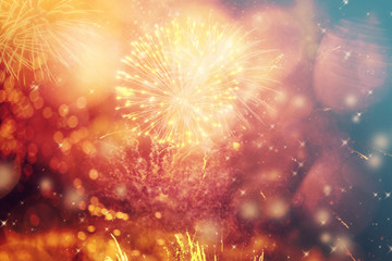 Abstract holiday background with fireworks and stars