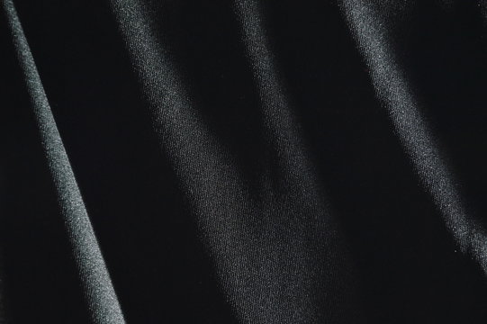 black fabric in shadow background and texture