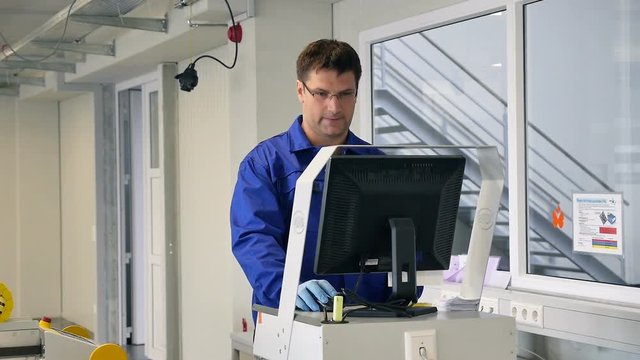 Man is coming to the computer