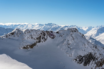 Skiing and Snowboarding in the winterly Stubai Alps