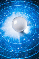 a magic crystal ball on blue astrology background