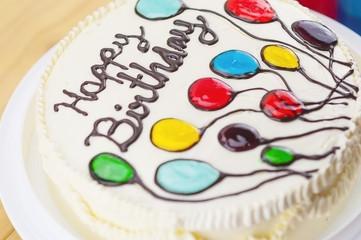 Colorful happy birthday butter cake