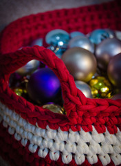 Christmas balls in a crochet basket