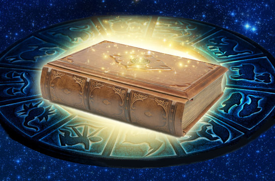 A Magic Esoteric Book Lying On Zodiac Like A Concept For Studying Astrology