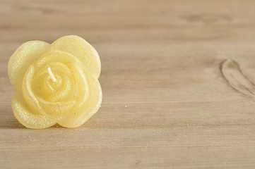 Candle in the shape of a rose