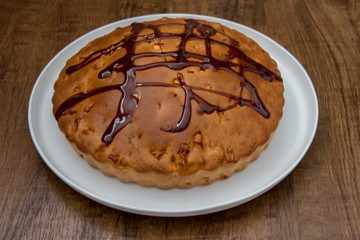 Homemade pie on rustic background