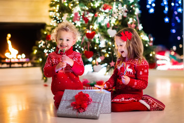 Kids under Christmas tree