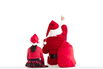  little girl and Santa Claus pointing to white background