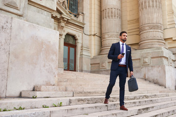 Young businessman on the stairs