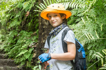 outdoor portrait of young child boy, tourism concept