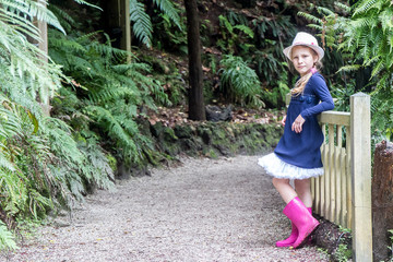 outdoor portrait of young happy child girl on natural background