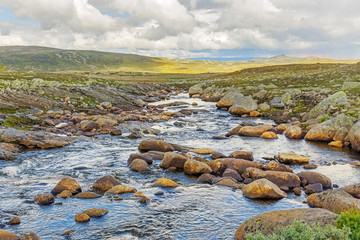 River acroos the Hardangervidda plateau in Hordaland, Norway