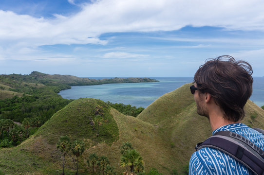 Tourist hiking in the hills, Labuan Bajo, Flores island, Indonesia