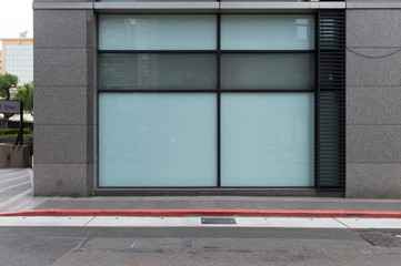 Large blank billboard on a street wall, banners with room to add your own text