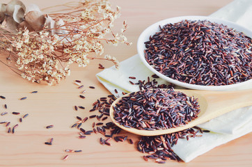 Thai Riceberry On Wooden Table