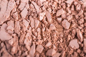 Crushed blush on a white background. Texture