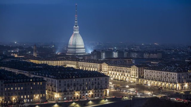 Time Lapse in Piazza Vittorio Veneto with background the Mole Antonelliana with sunset in Turin