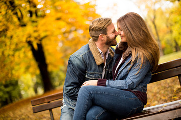 Young couple in the autumn park