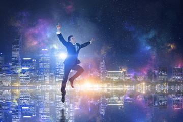 Businessman celebrating success . Mixed media