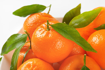 tangerines with leaves