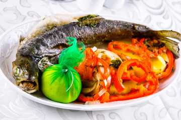 Grilled whole salmon with vegetables