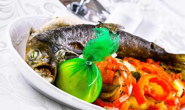 Grilled whole salmon with vegetables