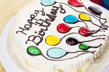 Colorful happy birthday butter cake