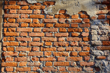 Old weathered brick wall fragment