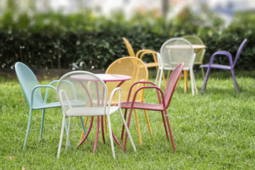 Colorful Chairs On A Garden
