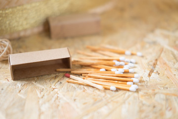 Box of matches on wood table