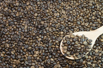 Coffee Beans background texture. Arabic roasting coffee - ingredient of hot beverage. Brown coffee beans for background and texture.