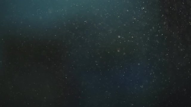 Saw dust falling, sawing wood in slow motion