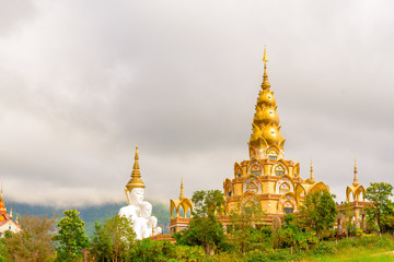 Naklejka premium The pagoda in Wat Phra That Pha Son Kaew Temple at Phetchabun, Thailand.