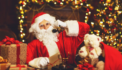 sad upset santa claus talking on phone