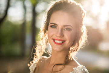 Radiant beautiful bride, portrait of a woman outdoor A big smile