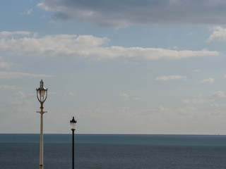Sea, Sky and Two Street Lamps