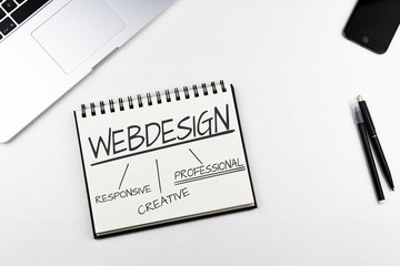 Notizbuch im Büro - Webdesign Konzept