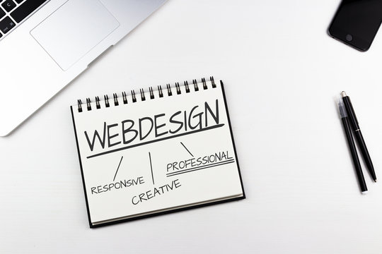 Notizbuch im Büro - Webdesign Konzept